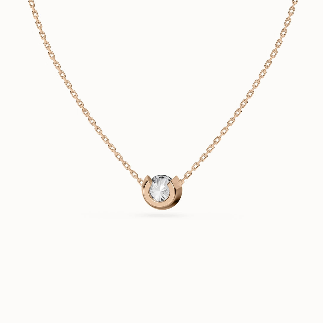 http://stephanievanzwam.com/cdn/shop/files/STEPHANIE-VAN-ZWAM-Aura-necklace-in-rose-gold-with-round-brilliant-lab-grown-diamond-2.webp?v=1695302105